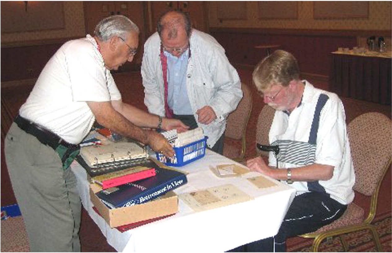 ASCGB - 2006 Convention at Swindon (weekend), Bill Trower's table at the Bourse; it looks as though Peter Fowke (seated) has found something interesting